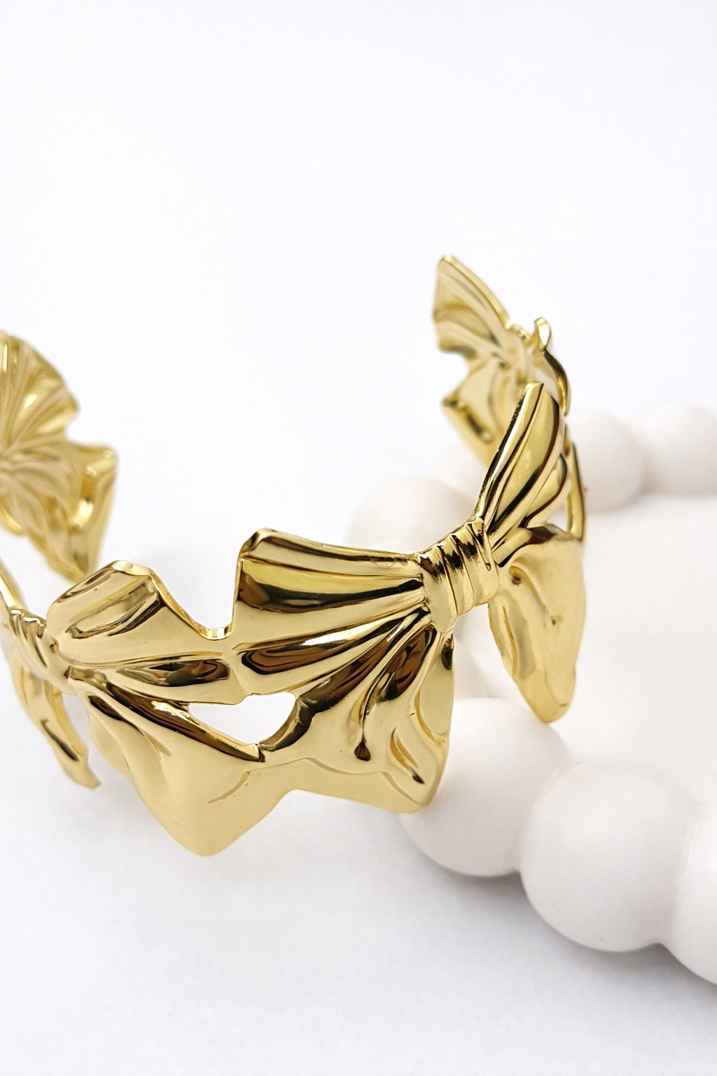 Double Bow Statement Bracelet – Sculpted Ribbon Cuff Bangle
