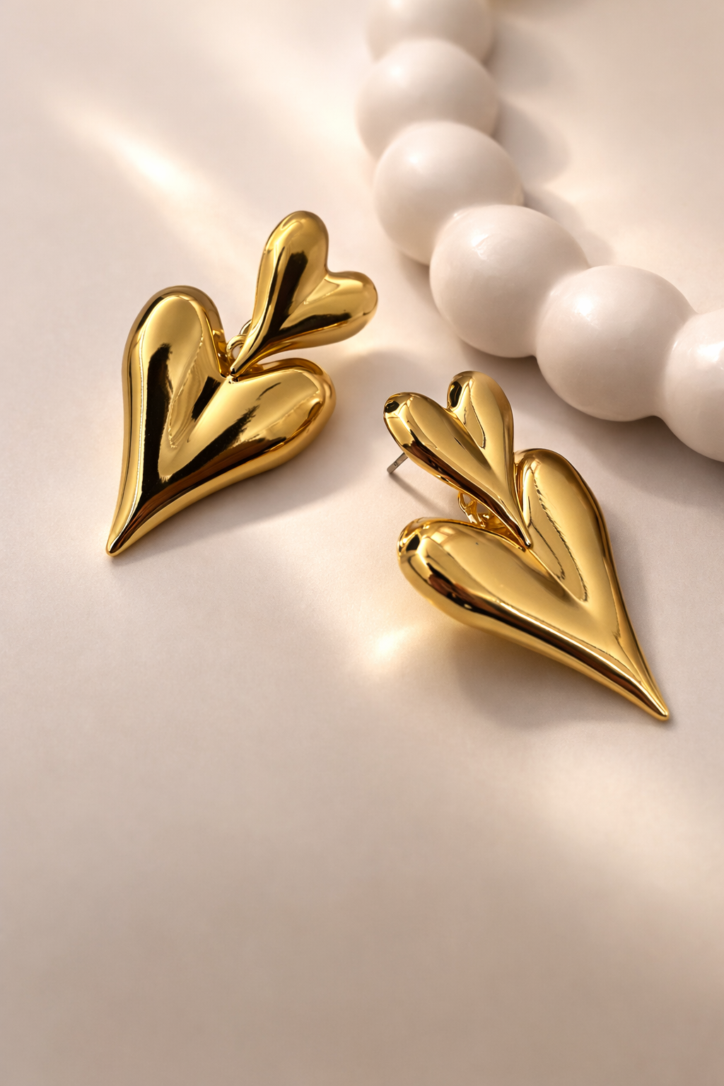 Double Heart Stud Earrings – Minimal Romantic Design