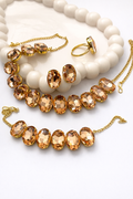 Elegant Gold-Plated Peach Crystal Necklace Set with Bracelet, Earrings & Ring