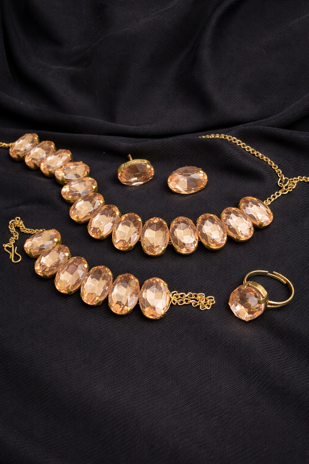 Elegant Gold-Plated Peach Crystal Necklace Set with Bracelet, Earrings & Ring