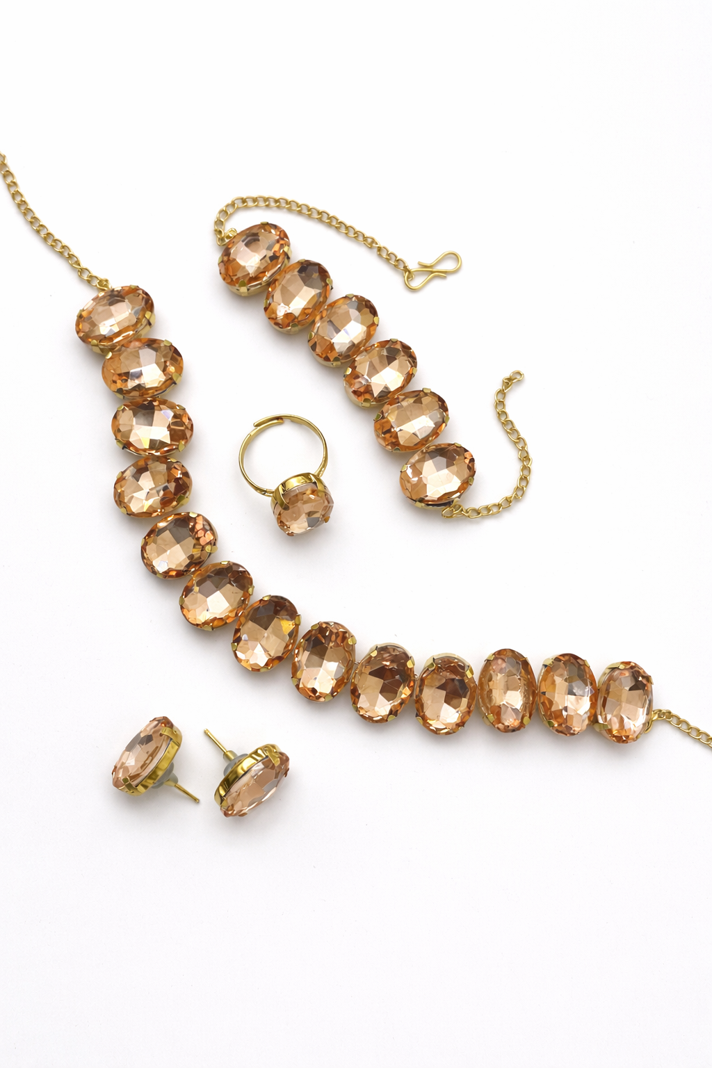 Elegant Gold-Plated Peach Crystal Necklace Set with Bracelet, Earrings & Ring